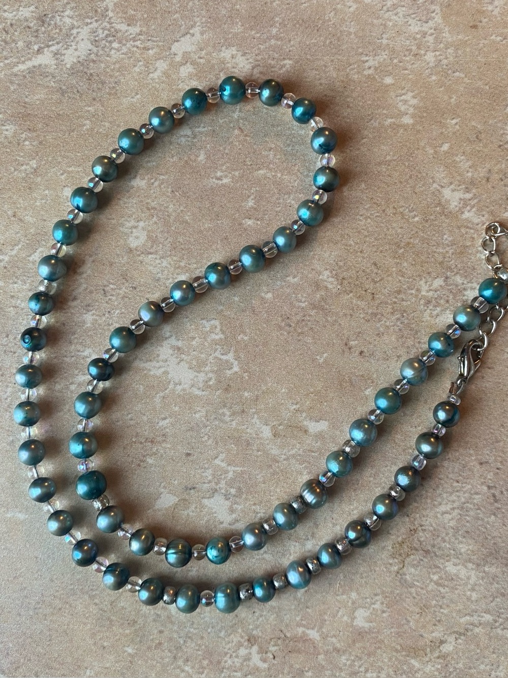 Blue cultured pearl and iridescent glass beads